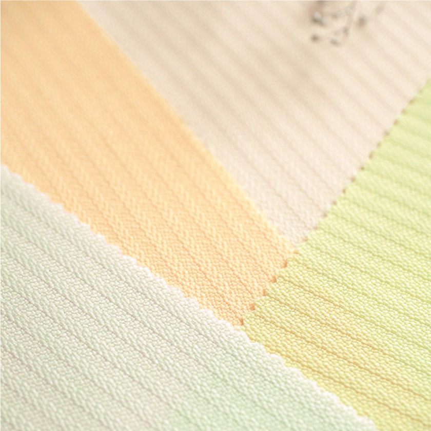 パステル③　抗ウィルスカーテンの生地アップです。うっすらとストライプが入っています。