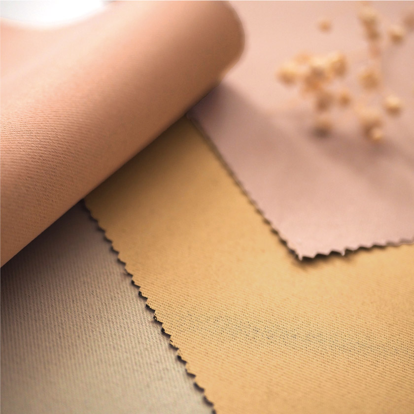 「遮光 24色全部が1級遮光カーテン」の生地アップです。ピンク系、オレンジ系見本です。