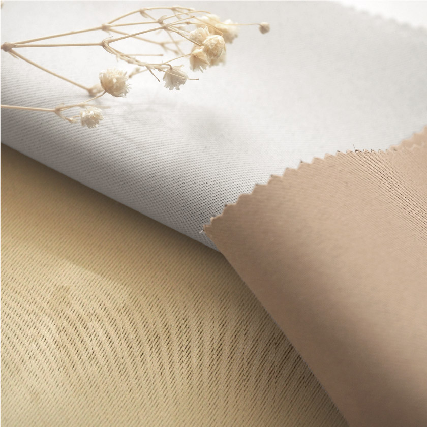 「遮光 24色全部が1級遮光カーテン」の生地アップです。ベージュ系とグレーです。