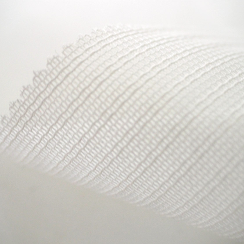 「制菌レース」の生地アップです。細いストライプが入っています。