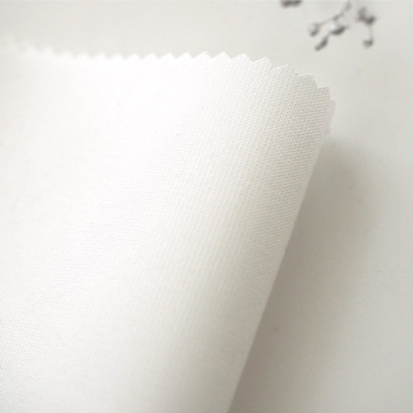 「糸のほつれを防止する耐久性レース」の生地アップです。色はホワイトです。