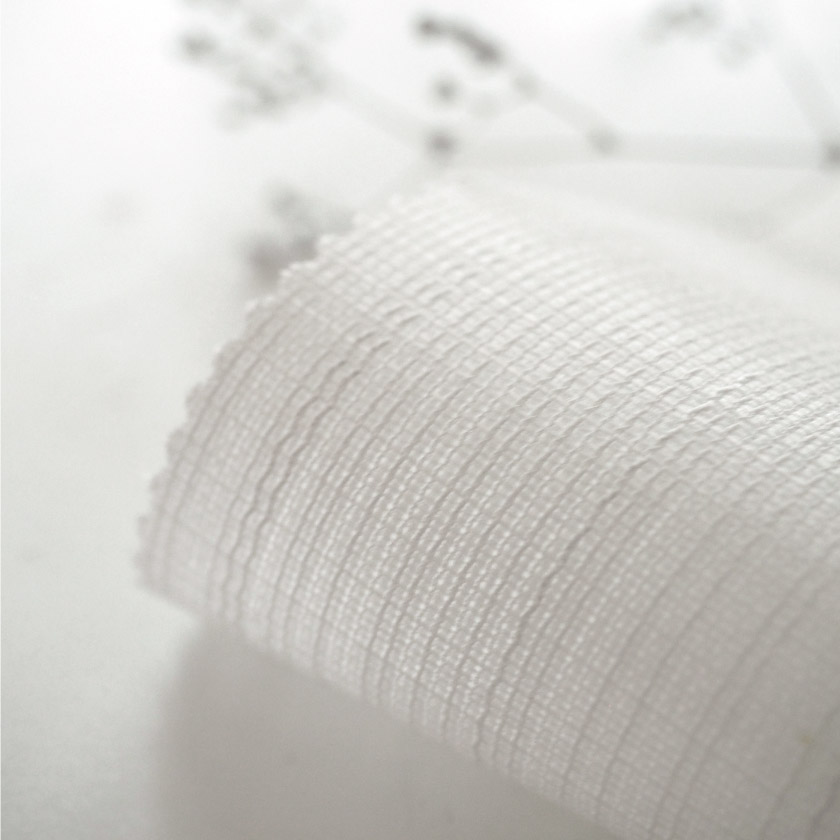 「快適な室温と省エネを考えたレース③」の生地アップです。さりげなくストライプが入っています。