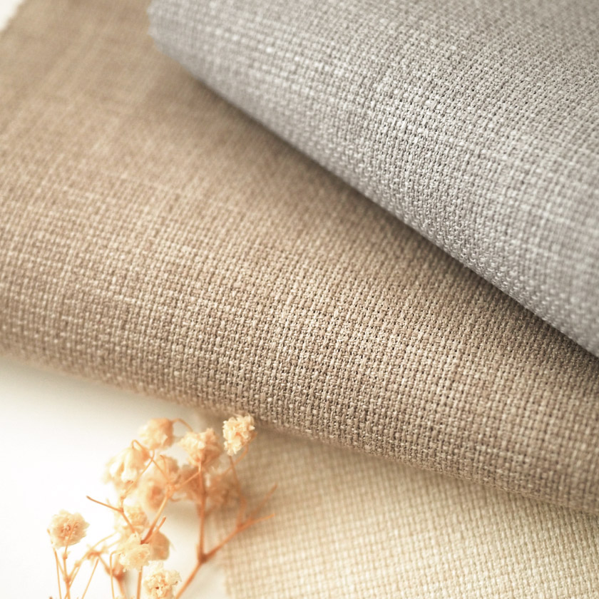 生地のアップ画像です。天然素材のような風合いです。